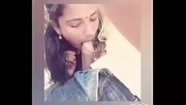 Young Tamil girl sucking her lover’s dick