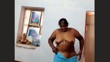 Mature Tamil Aunty Wearing Cloths