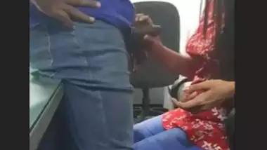 Giving blowjob in office