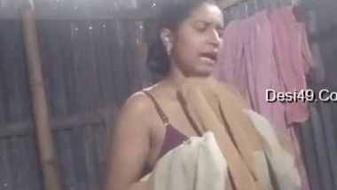 Lover watches and XXX records his village Desi GF taking a shower