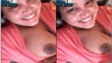 Indian chick in a red robe bares her natural XXX breasts to the sex fan
