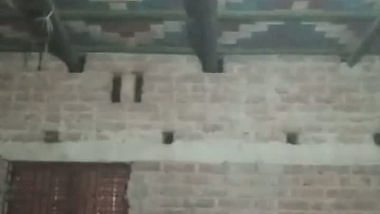 Village girl applying lotion to full nude body