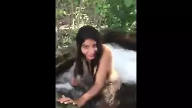 Teen in Indian Village take bath outdoor
