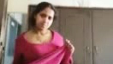 Indian Milf showing her boobs and undressing
