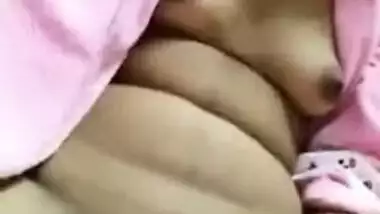 Pretty Desi girl in a pink robe demonstrates XXX slit in MMS video