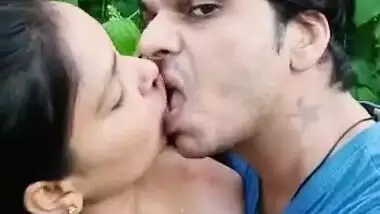 Sucking boobs of gf outdoors on selfie cam