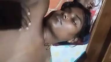 Village Desi XXX wife gets her boobs pressed by hubby while sleeping MMS