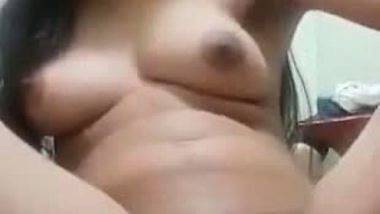 Delhi babe fingers her hairy pussy during a video call sex