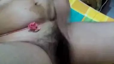 Chubby Desi wife records solo sex video in which she rubs hairy XXX twat