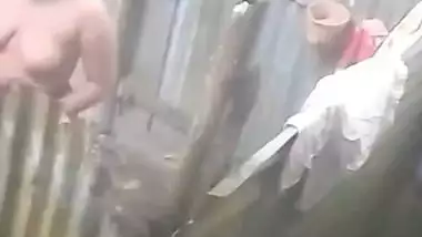 Neighbour village bhabhi bathing caught on camera