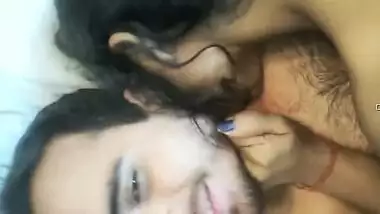 Bearded guy from India and girlfriend start morning with kissing