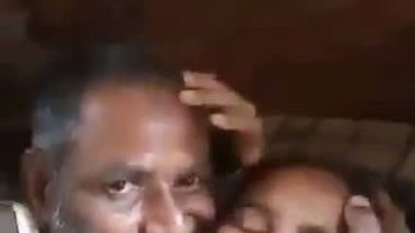 An old man enjoys the boob sucking of a desi lady