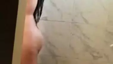 Indian girl bathing