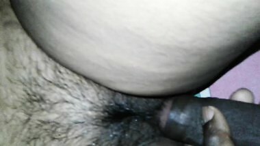 playing with my wife's hairy pussy. 