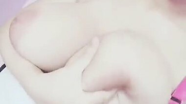 Hit beautiful girl playing with her big melons