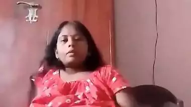 Horny lady puts a beer bottle in her pussy in Telugu porn