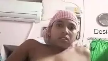Naked Desi wears a pink towel on head and masturbates pussy