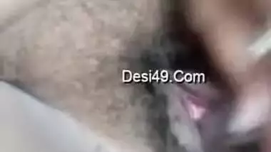 Fat Indian aunty fucks her own hairy twat with the new sex toy