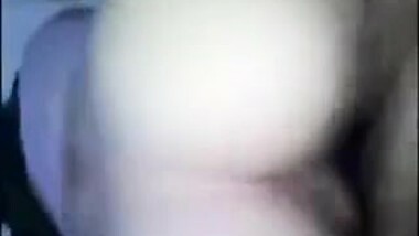 Indian school girl riding.