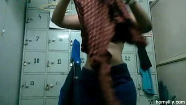 Horny Lily taking off her clothes in the locker room