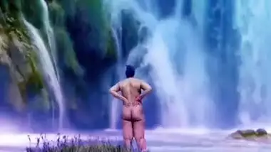 Desi publicly nude in front of water fall.