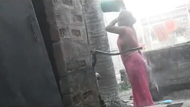 my maid takinghower at backyard