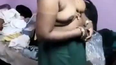 very shy indian aunty stripping infront of...