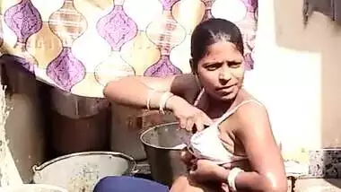 Pregnant Desi Indian Village girl Bathing outdoor 