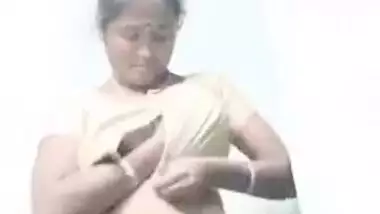 XXX-looking Desi mom is proud of her saggy twins and exposes them