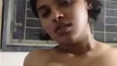Indian teen squeezes her XXX titties showing them off on camera