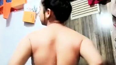 An 18-year-old sexy teen squeezes her big boobs and ass