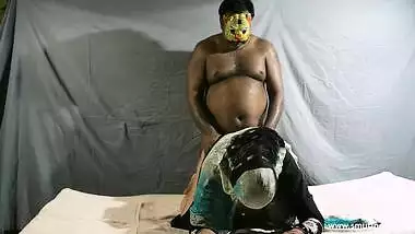 Man in funny animal mask fucks Indian female in doggystyle sex position