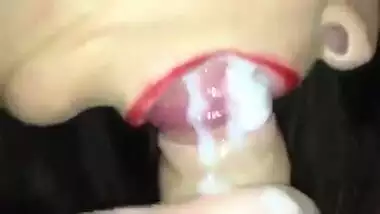 Desi housewife with red lipstick sucks cock and cum