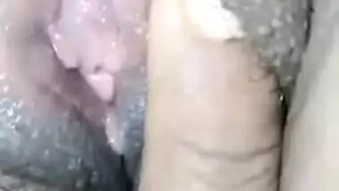 Man touches XXX pussy and spreads labia of Desi babe in close-up