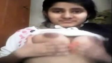 cute girl fondles boobs on webcam