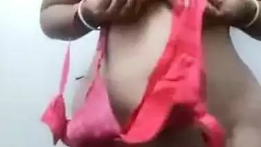 Desi wife performs a sex show flashing her XXX sized boobs on camera