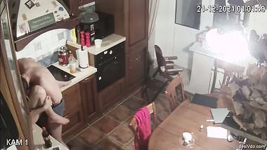 Couple fucks in the kitchen room