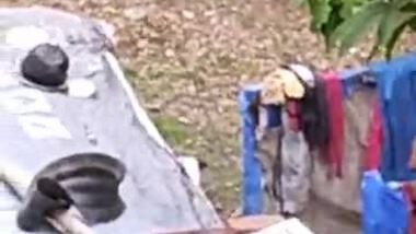 Indian girl bathing outdoor