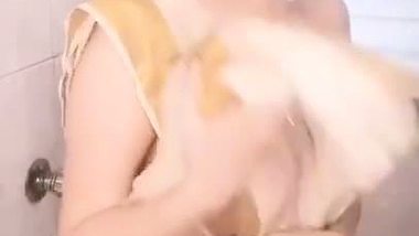 Model wet tease in bathroom video