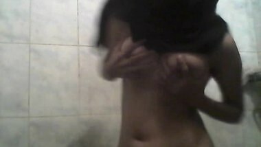 girl dancing in bathroom naked