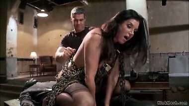 Chained MILF riding huge dick