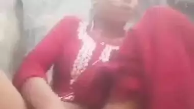 Horny village Desi girl fingering her shaved pussy on camera
