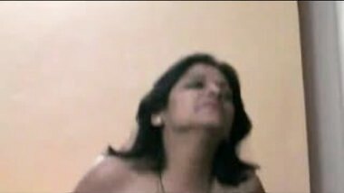 Mature Indian whore shows off her big tits and ass
