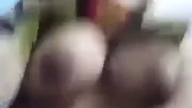 Desi fatty poses for the camera to reveal her big XXX boobs and slit