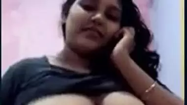 Young show her big boobs while talking on...