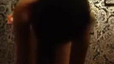 Skinny Indian woman strips in her bedroom. 