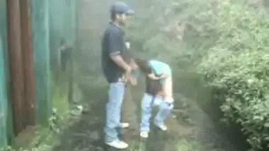 Indian girl sucking and fucking outdoors in rain