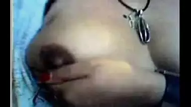 Mature woman’s Indian porn of showing tits