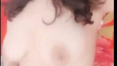 Horny Indian girl fingering shaved pussy in nude