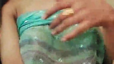 Beautiful Babe wearing only Saree showing her beautiful body